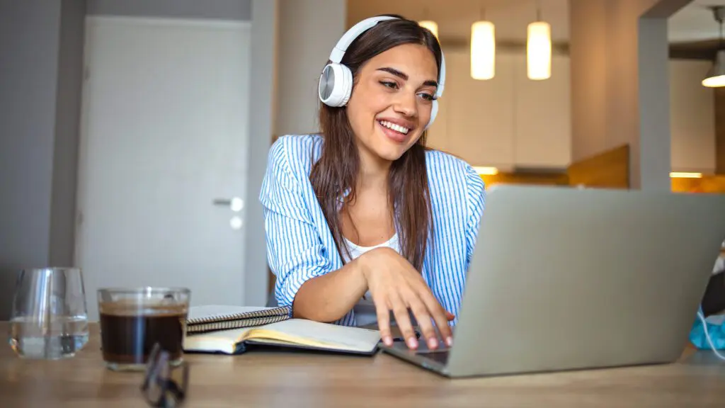 College student enjoying Xfinity's fast internet network while saving money.