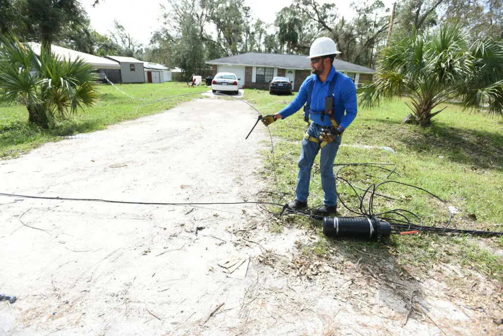 Comcast senior management officials and field service technicians assess damage and make repairs following the destruction caused by Hurricane Helene