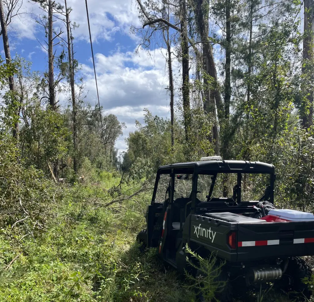 Comcast's Storm Team 1 UTV looking at damaged fiber due to Helene.