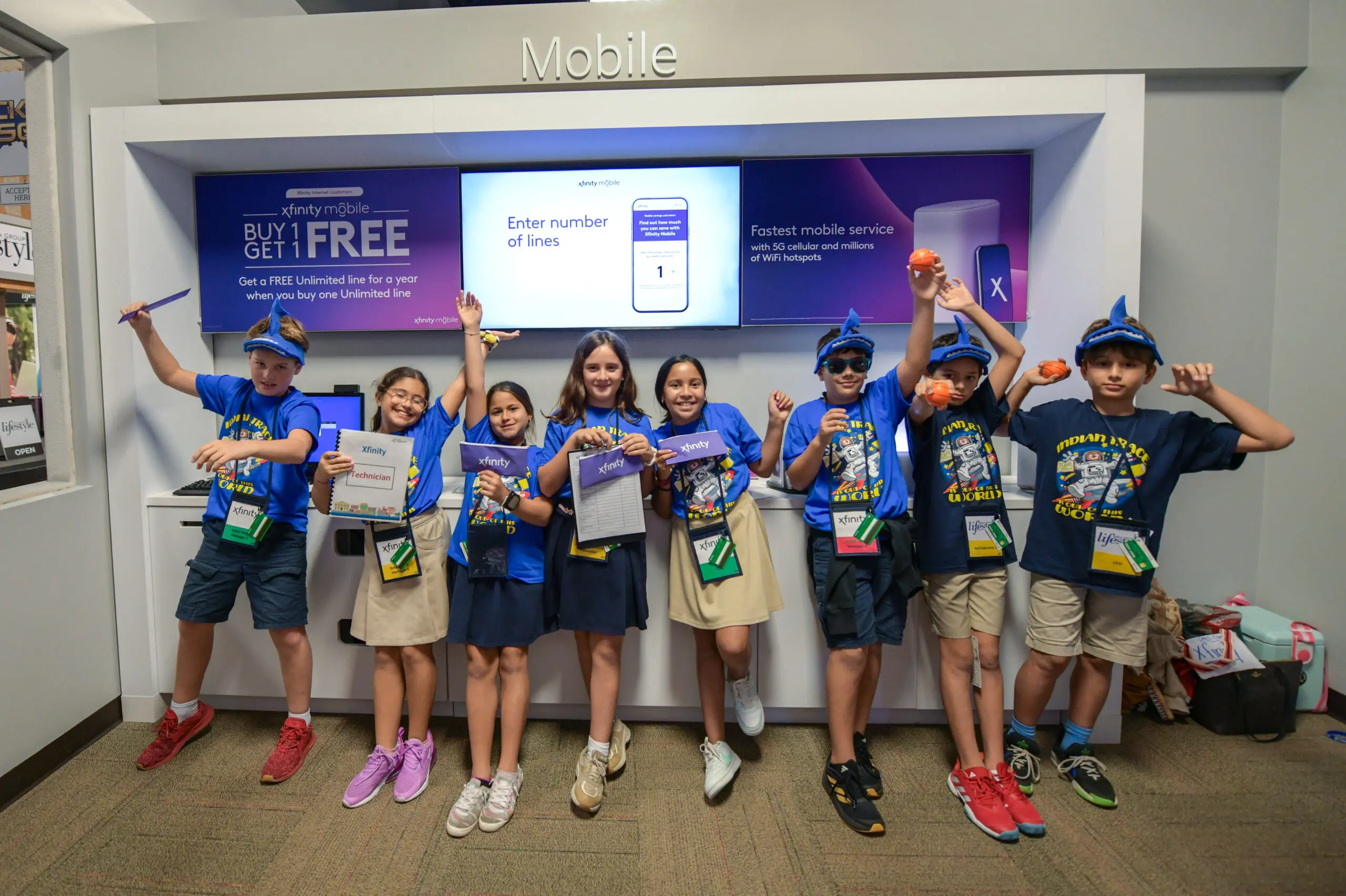 Students posed at the JA Xfinity Store