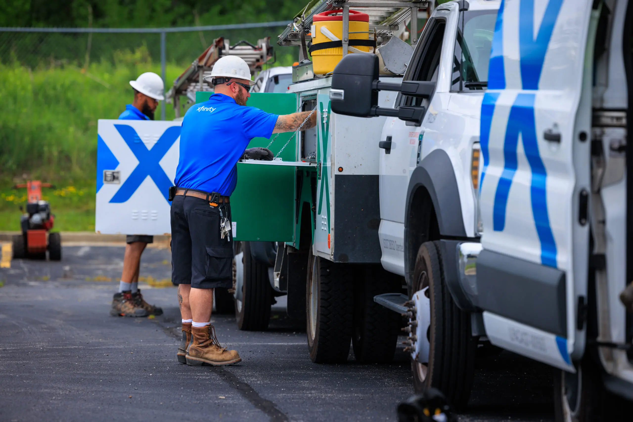 men in their work vans