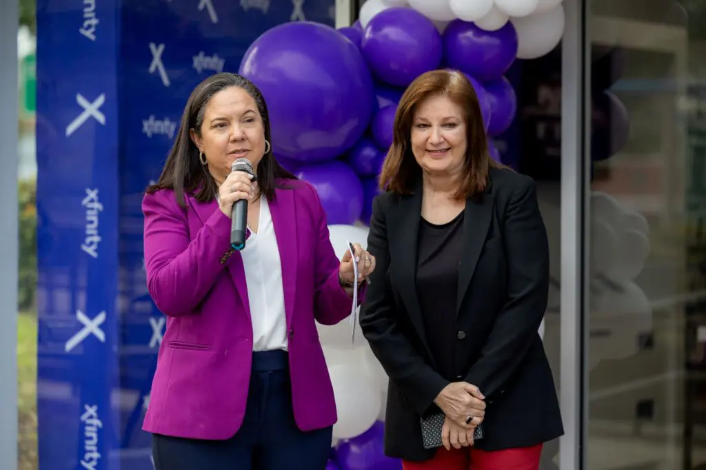 woman speaking on a microphone