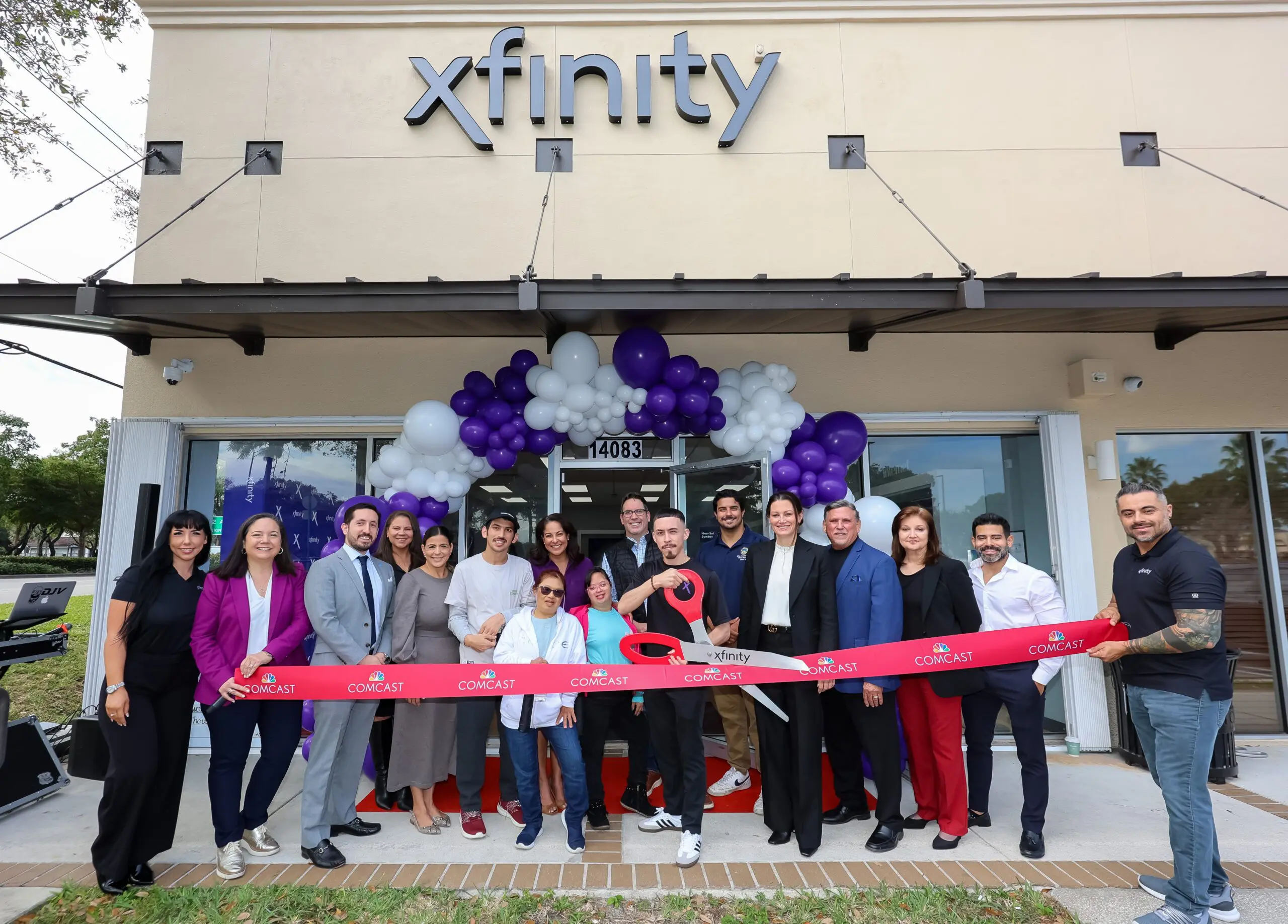 people at a ribbon cutting ceremony