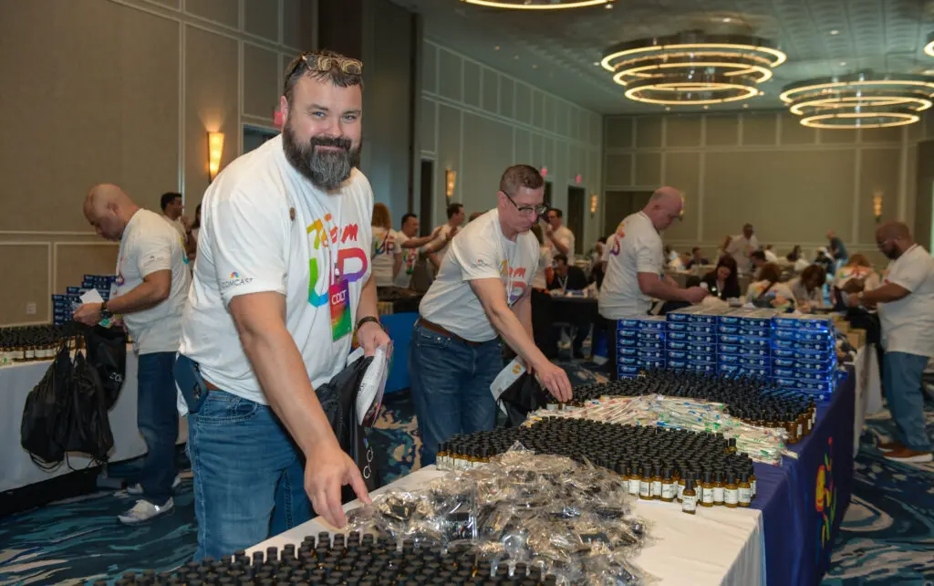 group of people putting together hygiene kits