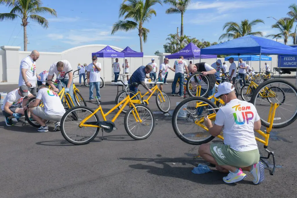 people fixing bikes