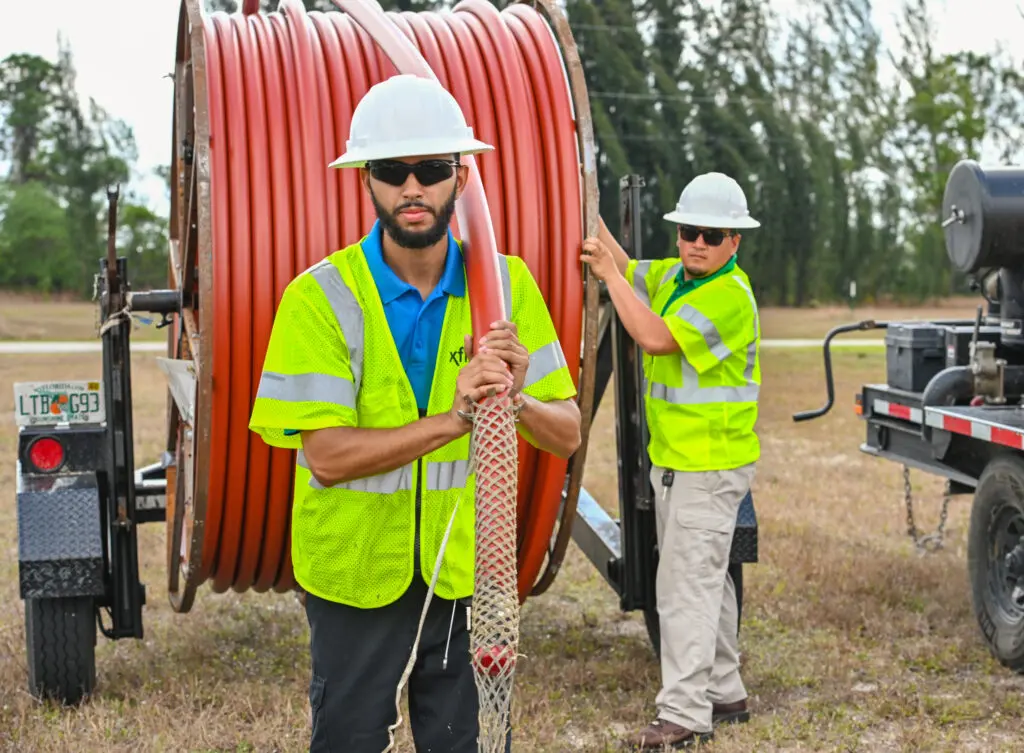 Comcast technicians prepare to install a new network in Charlotte County, FL.