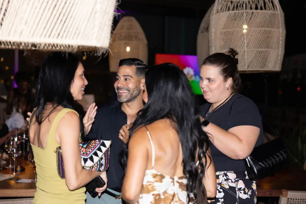 People having a conversation at an event
