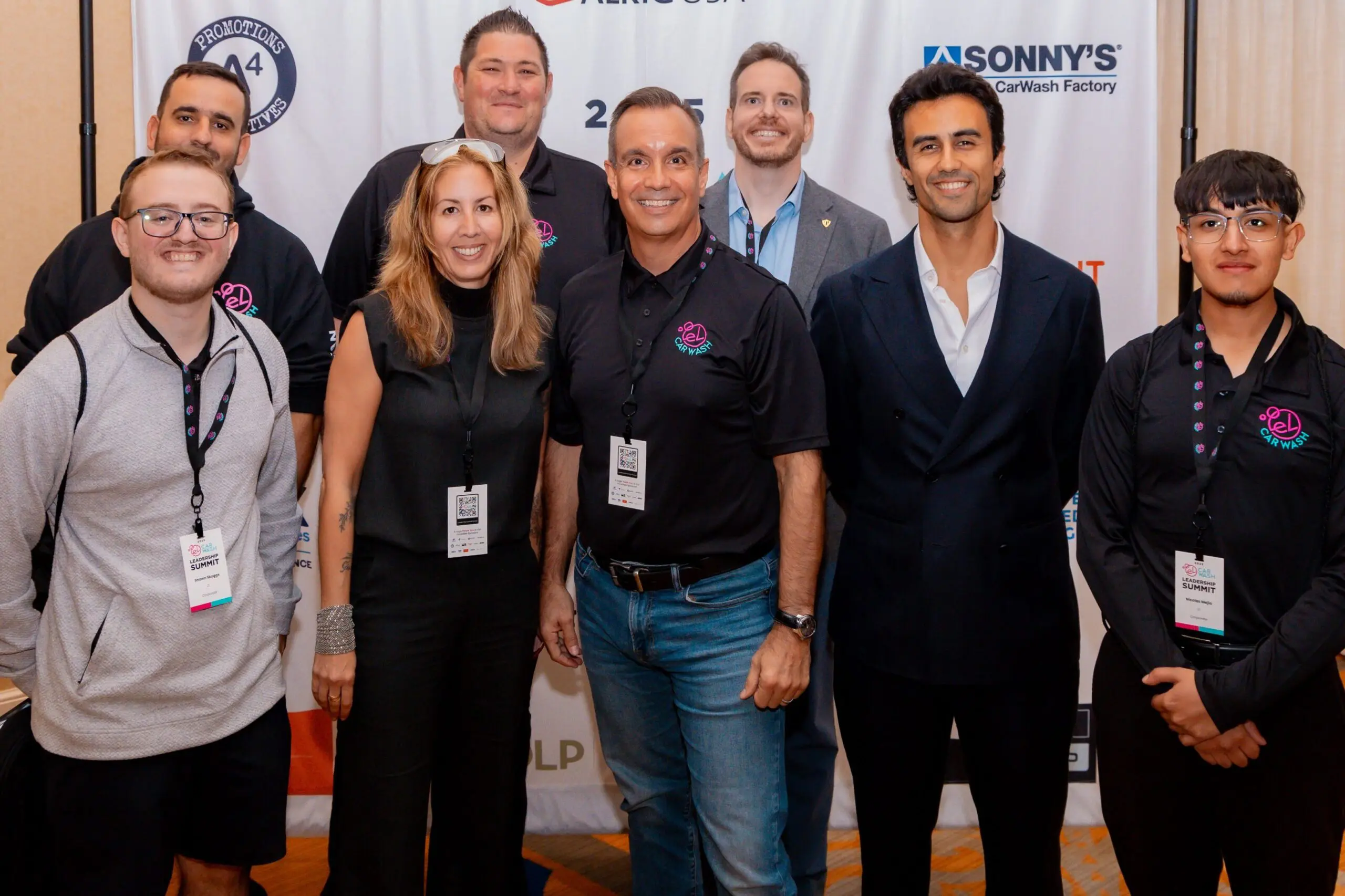 Jerry Gomez surrounded by his team