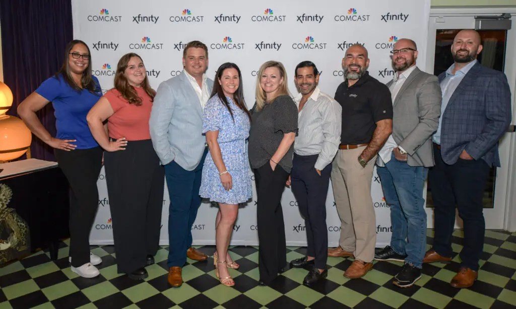 group of people pose for a picture