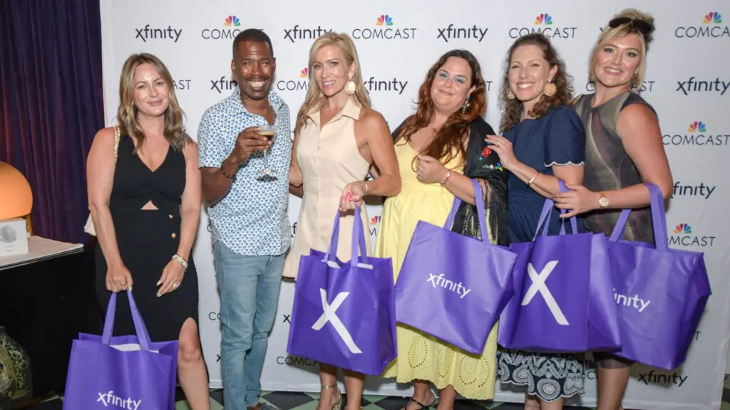 six people posing for a picture
