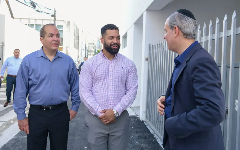 three men talking