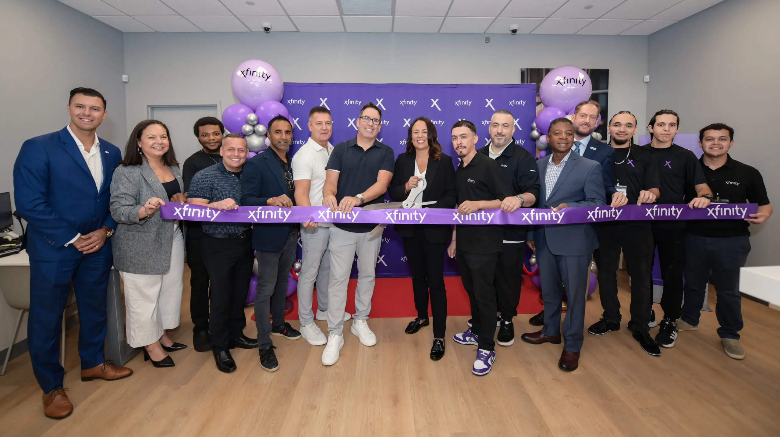 People at a ribbon cutting ceremony