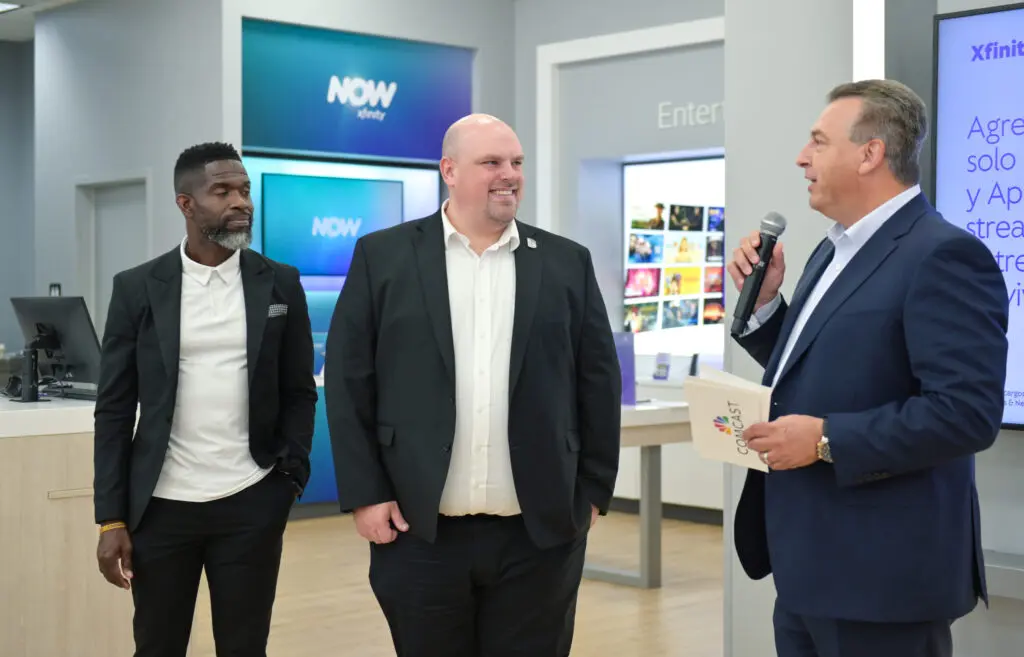 Three men at an event