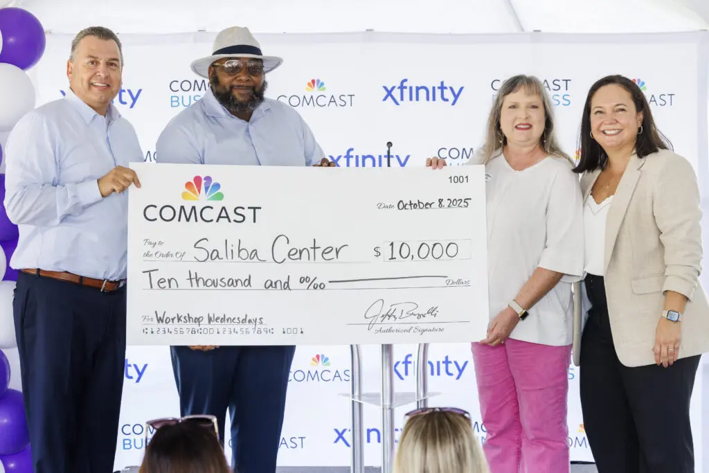 Comcast presents $10,000 in support to the Alfred Saliba Family Services Center to support digital skills programs in Dothan, AL on Wednesday, Oct. 8, 2025.