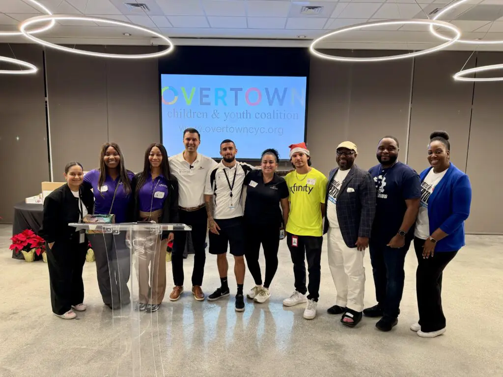 Comcast team members gather for a photo at the event.