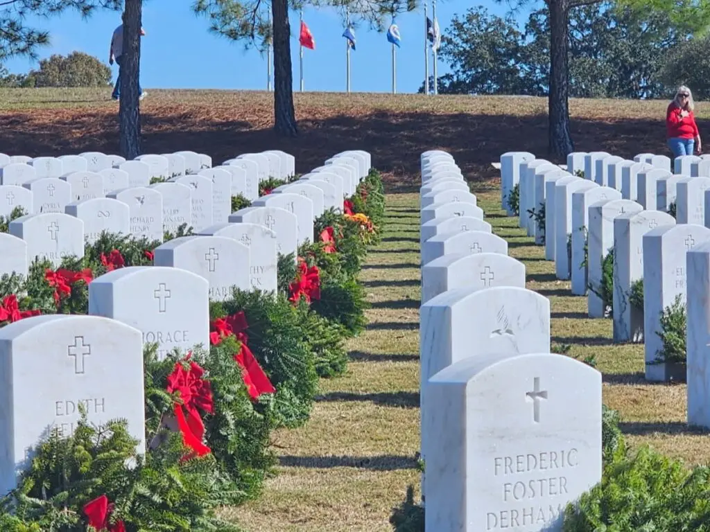 Wreaths at headstones of fallen service members