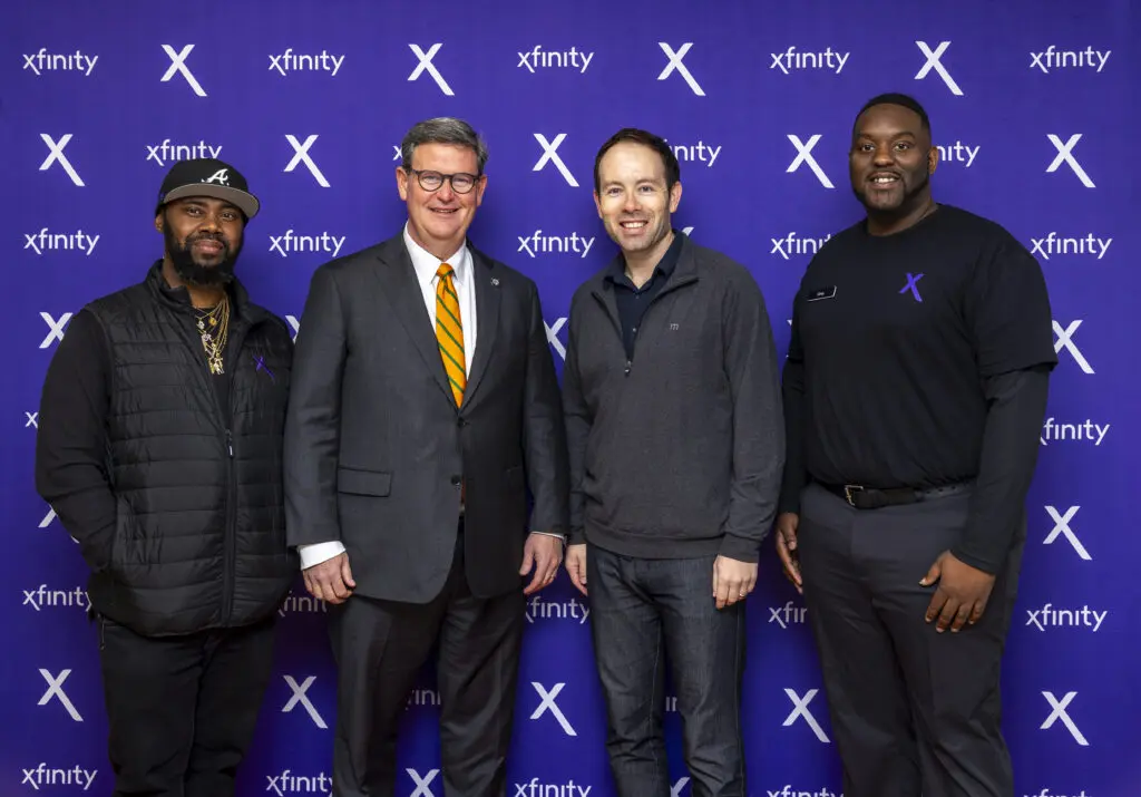 Mayor John Dailey meets with the store's team.