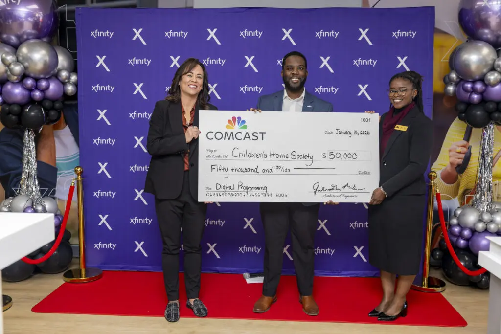 Comcast presents $50,000 to Children's Home Society.