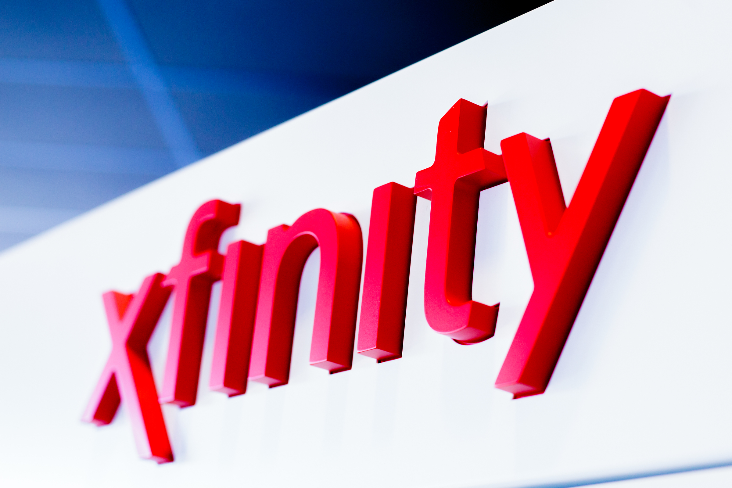 Xfinity logo displayed on a wall.