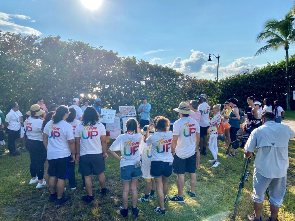 Comcast employees on beach in Palm Beach County