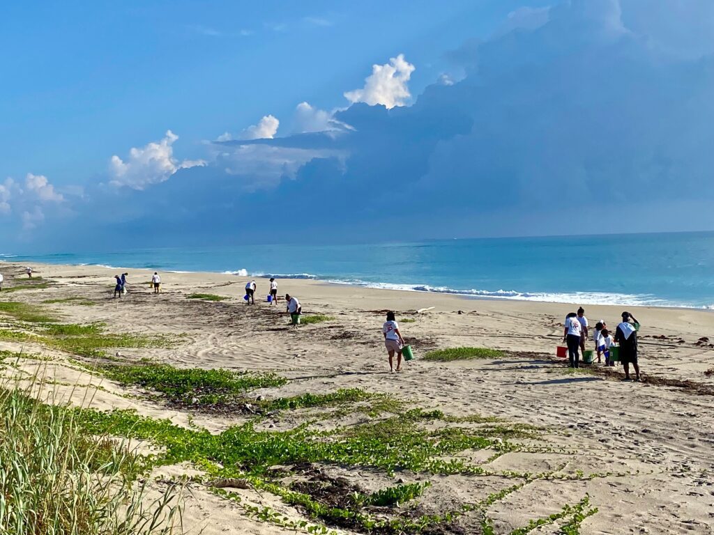 Comcast employees on beach in Palm Beach County