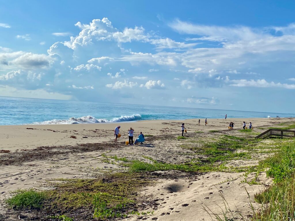 Comcast employees on beach in Palm Beach County