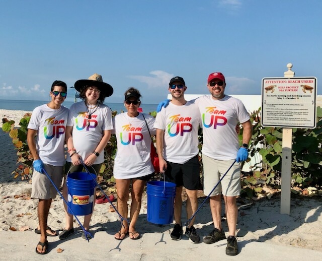 Comcast employees on Vanderbilt Beach in Naples