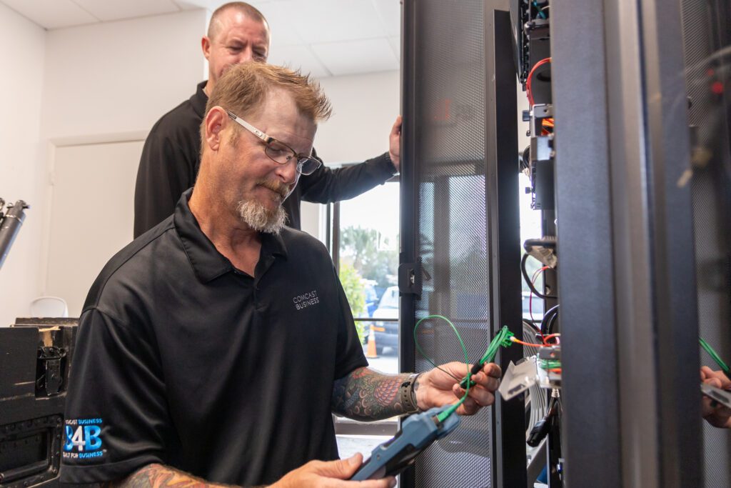 A man working with technology equipment