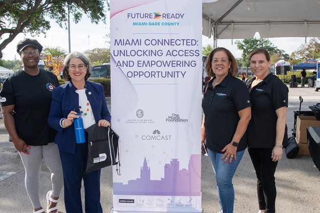 Miami Dade County Mayor, Daniella Levine Cava posing with three other people.