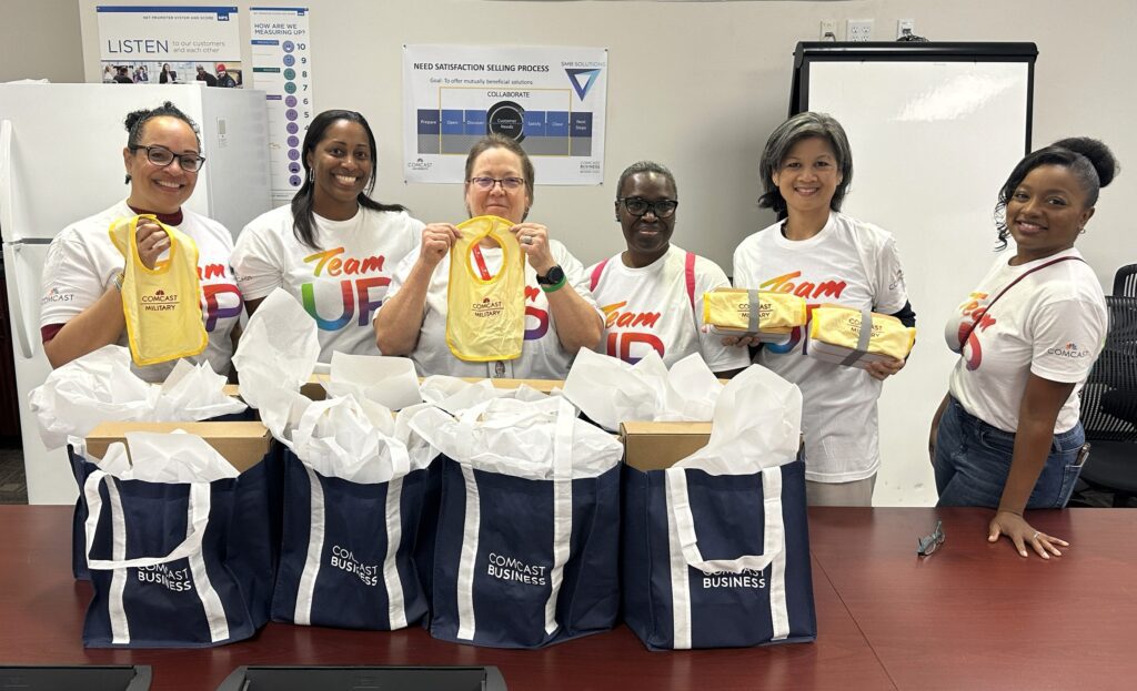 women packing gift bags.