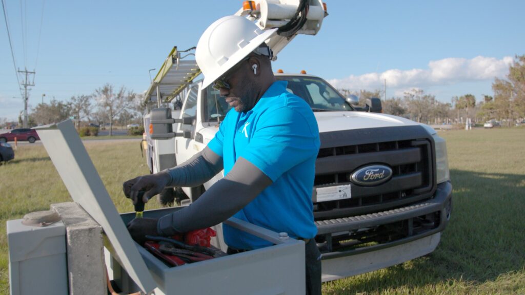 Comcast tech working on an installation.