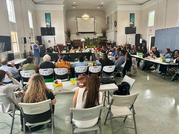 People sitting down at a training session