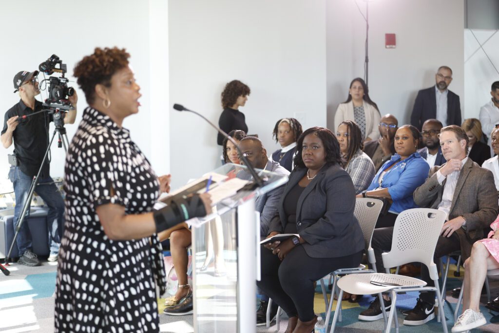 Woman delivers a speech.