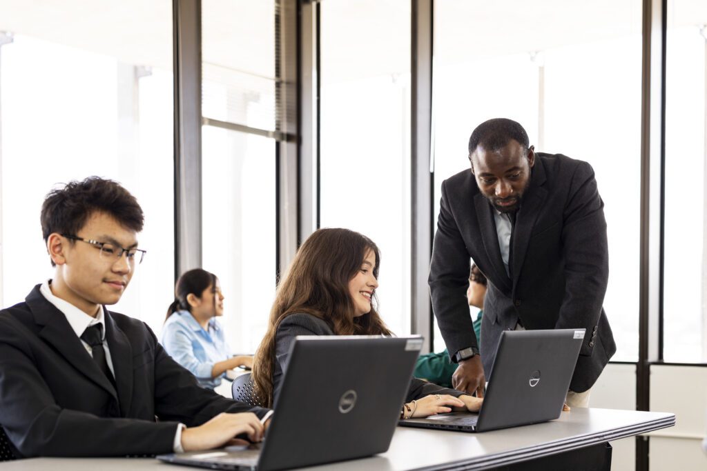 Students and teacher in a classroom setting