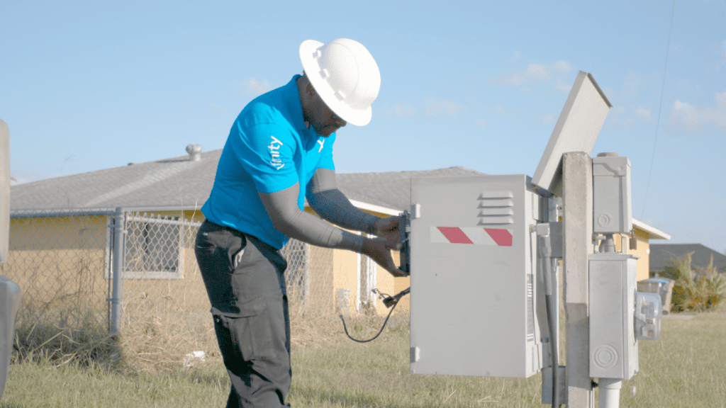 Xfinity tech working at a home