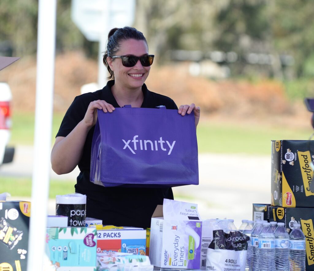 Xfinity representative greets residents of Perry, Florida's Comcast Comfort Station post-storm.