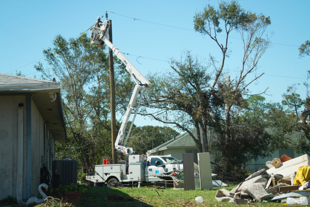 Crews from Comcast work to restore the network