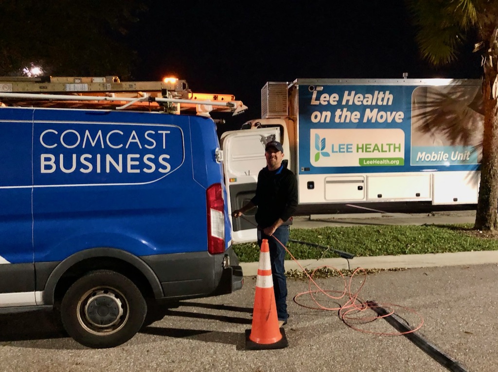 Comcast Business employee volunteers at a Florida community event.