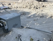 Equipment buried in sand