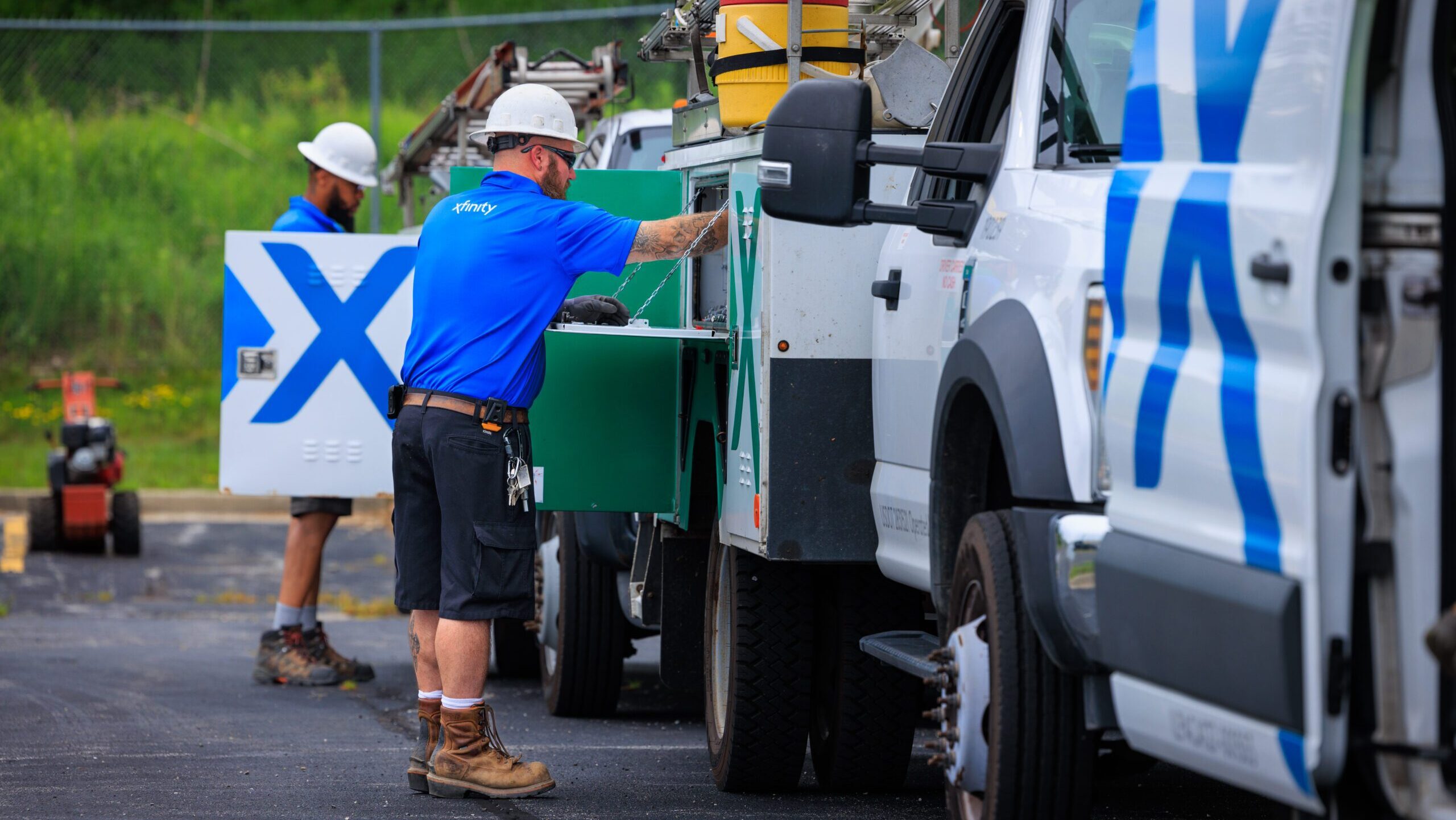 men in their work vans