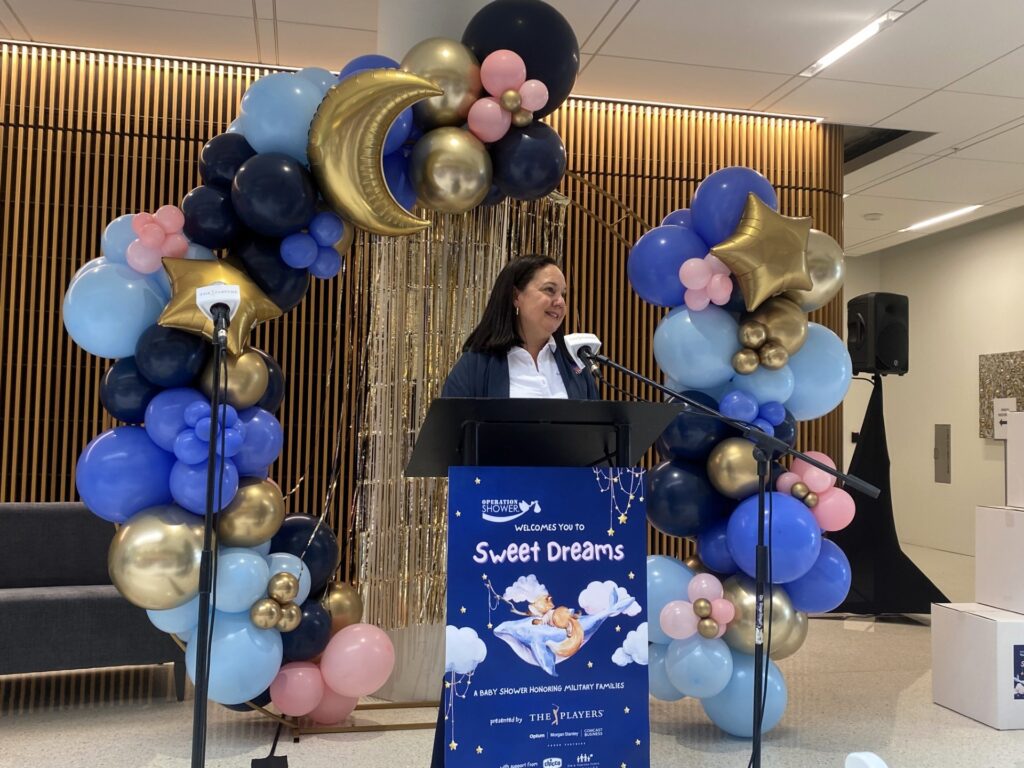 Michelle Oyola McGovern speaks to military families at Operation Shower.