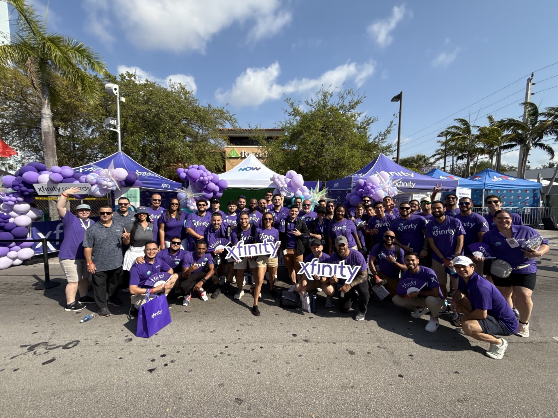 group of people pose for a picture at an event