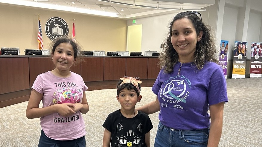 The Cabral family arrives at the internet sign-up event.