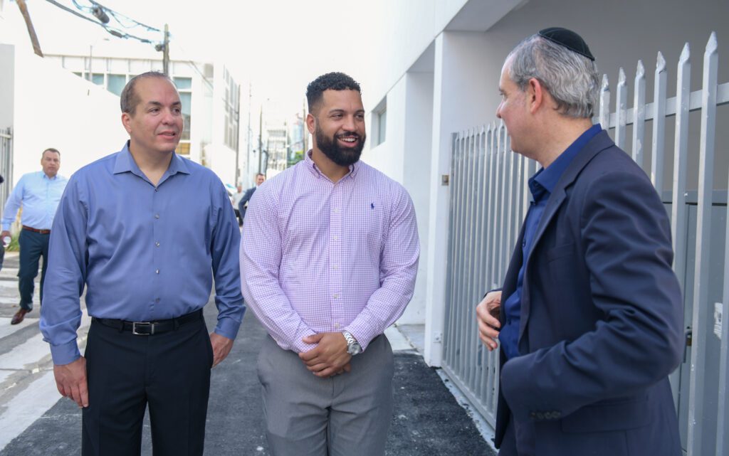 three men talking