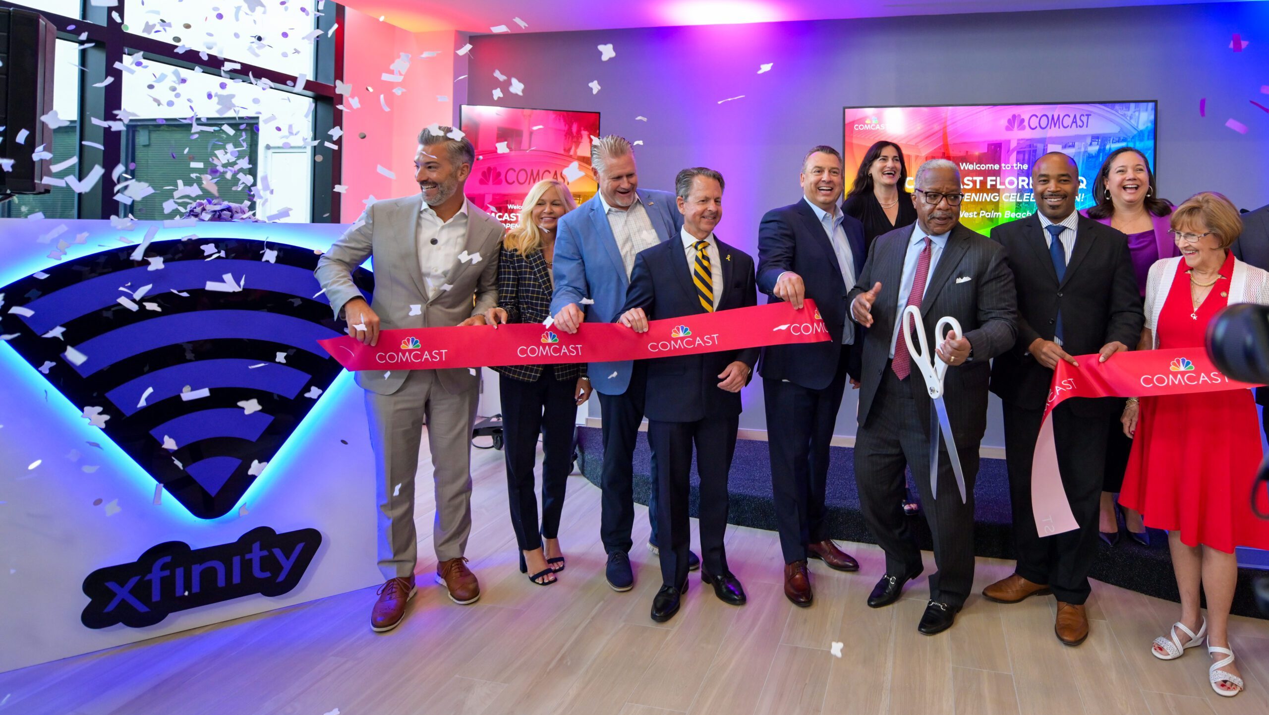 West Palm Beach Mayor Keith James cuts the ribbon at Comcast's new Florida Region headquarters.