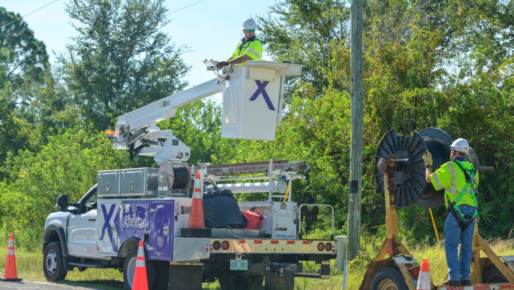 technicians working on a street
