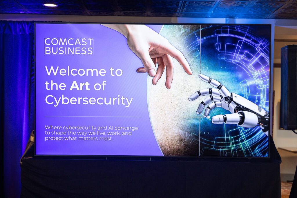 A welcome sign is displayed for the cybersecurity discussion.